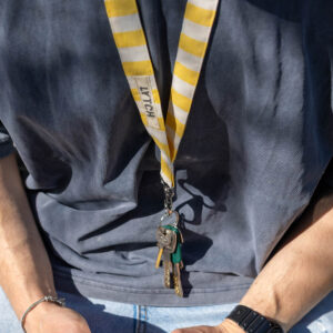 Yellow striped lanyard.